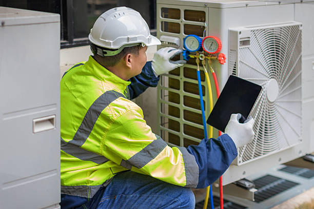Professional Air Conditioning Repair technician working in College Point, NY